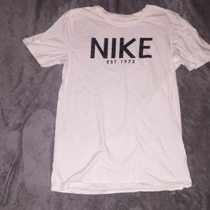 White and black nike shirt